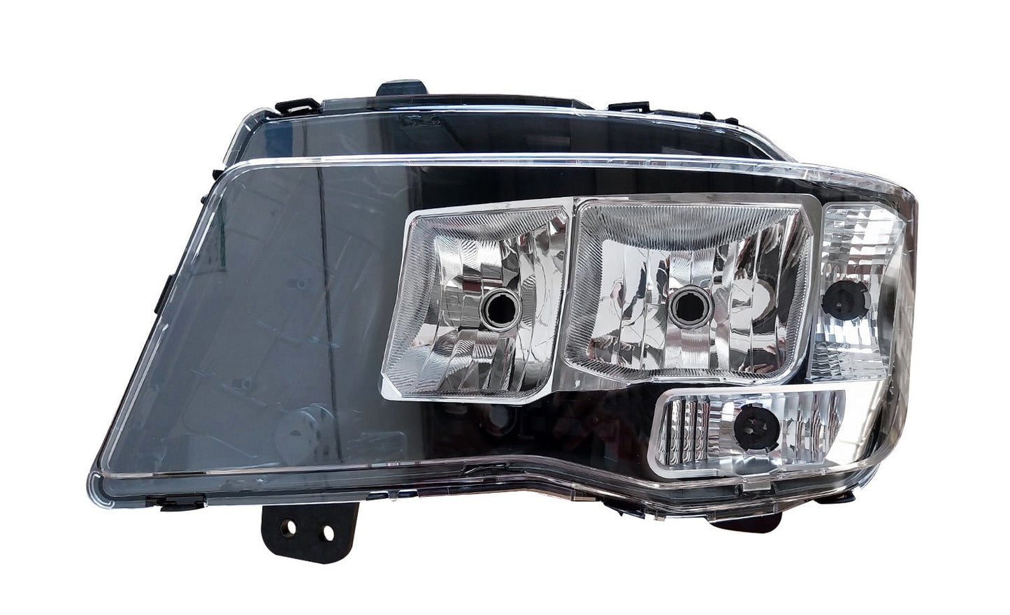 Proiettore Sinistro Elettrico Alogeno 24V Con Porta Lampada Senza Lampadine (H7 - H7 - P21/5W - Py21W) Con Motorino - Connettore Rettangolareposteriore Centrale Sinistro 9 Pin - Man - TGS 2020 - OE 81251016731 - Carrozzeria Truck