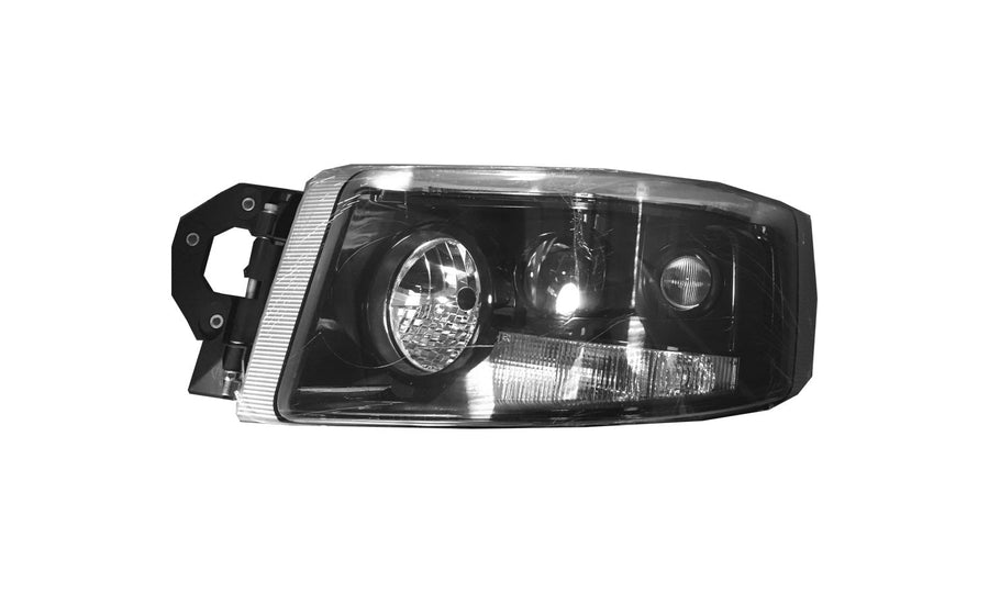 Proiettore Sinistro Elettrico Nero (H3 - H7 - H15 - Py21W - W5W - Tipo He) - Renault - Nuovo Premium - OE 7421554745 - Carrozzeria Truck